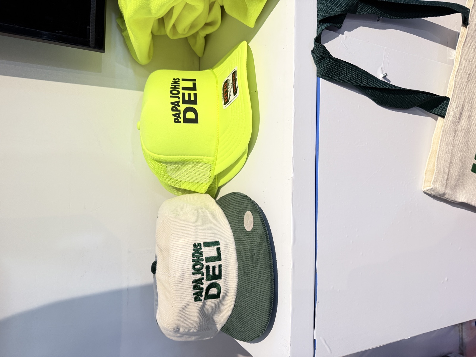 Finished shirts, hats, patches, and event merch for Event Heat Press
